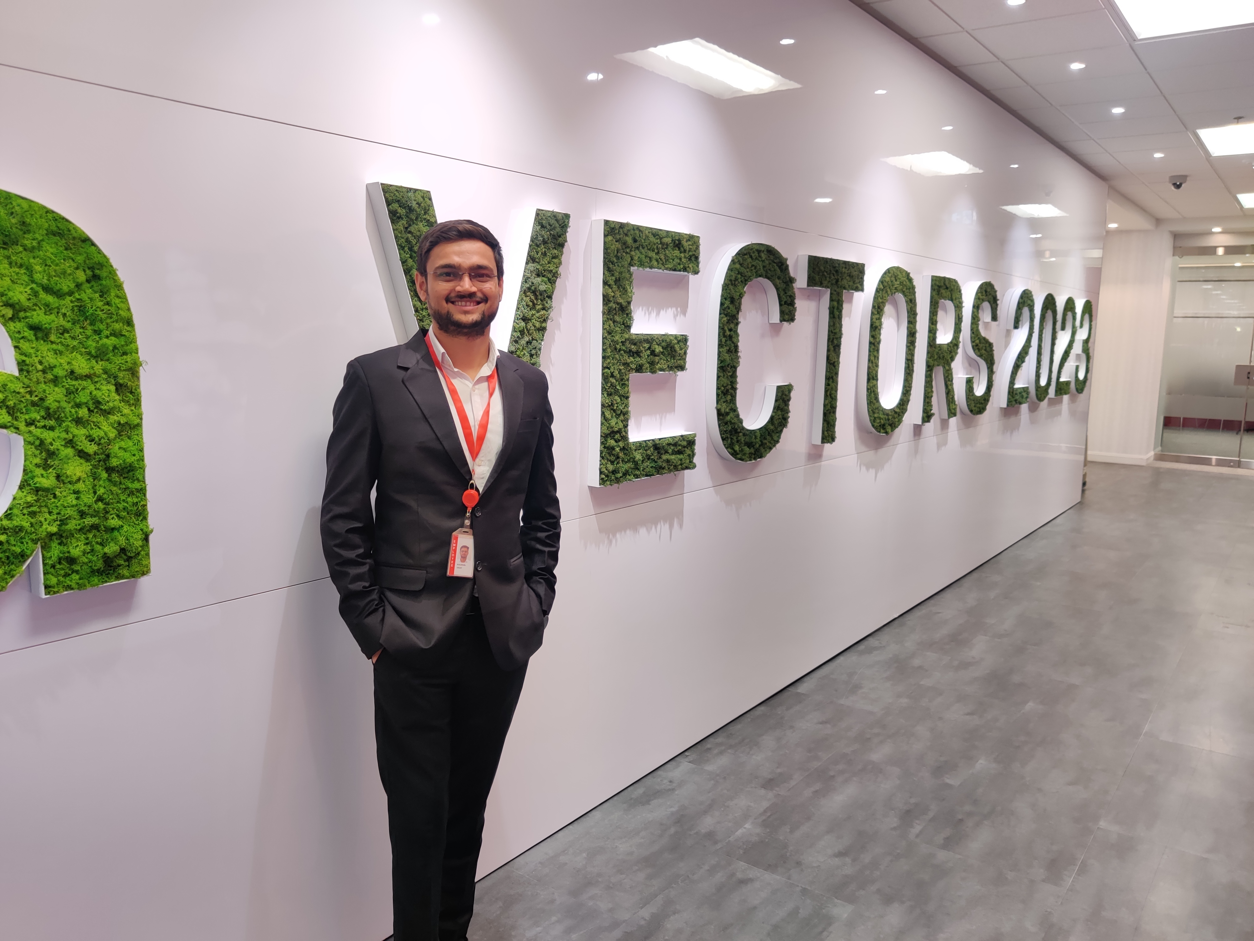 Man standing in front of a living wall